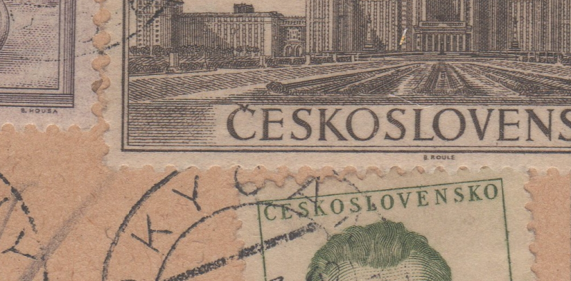 Closeup of stamps over original postmark